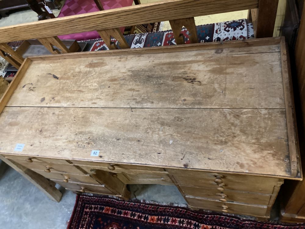 A Victorian pine kneehole desk, width 128cm depth 55cm height 82cm